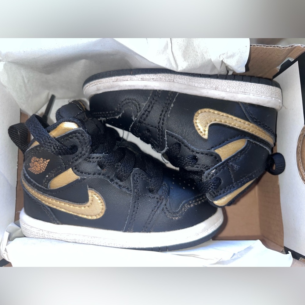 Jordans Nike Kids Black and Gold High-Top Sneakers
